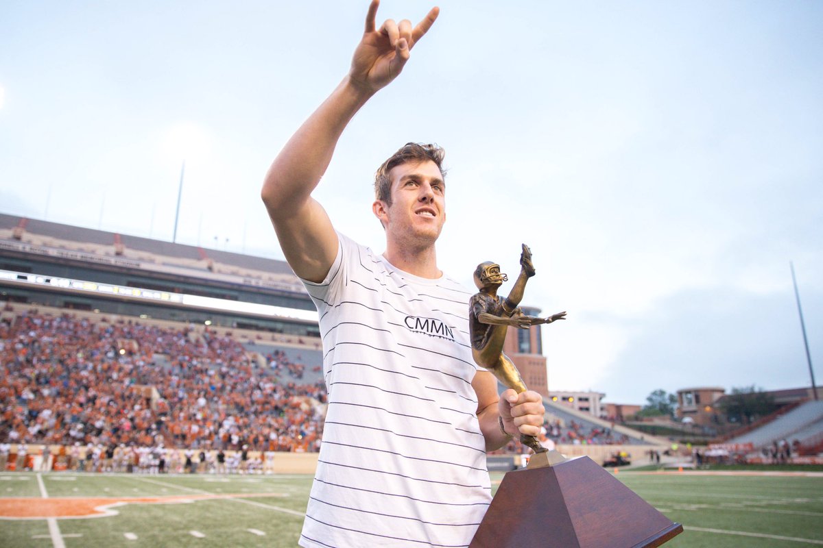 TexasFootball's tweet photo. The Punter. The Coach. The Trophy. 
@CoachTomHerman honors @mdcksn for his @RayGuyAward tonight at halftime. #ThisIsTexas #HookEm https://t.co/4pXyqpFTEJ
