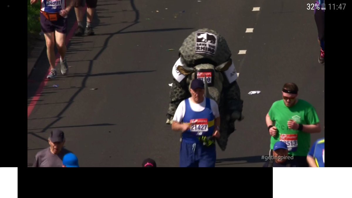 Serious props to the guy running this in a rhinoceros suit 🦏 #LondonMarathon #LondonMarathon2018