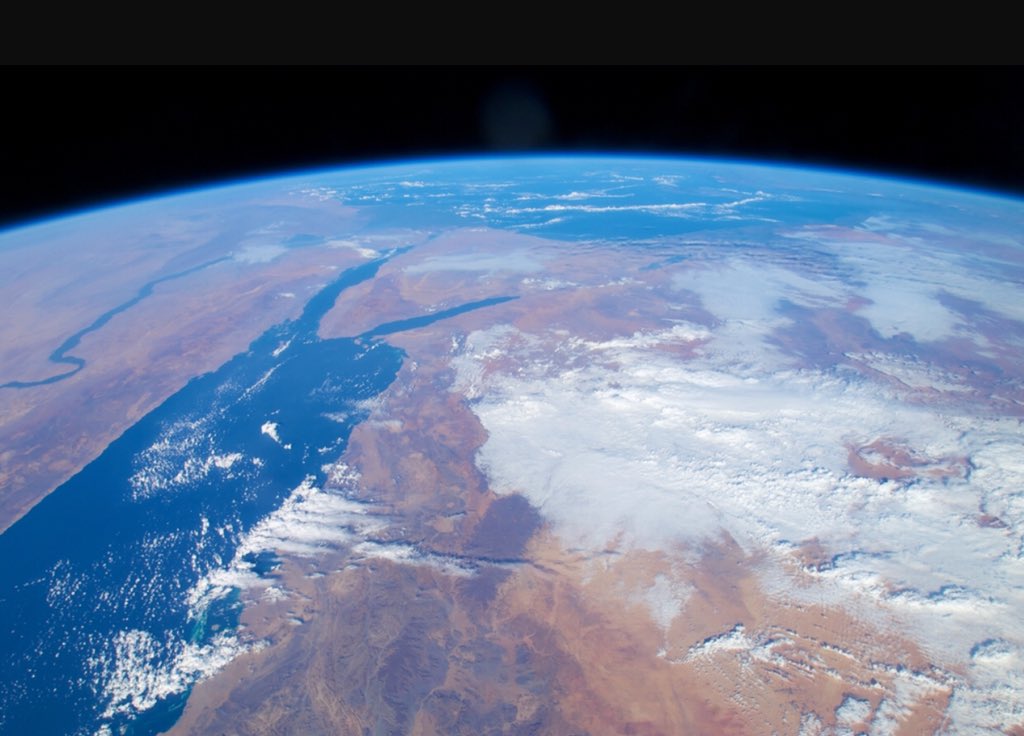 Astro_Flow's tweet image. I took this picture from space in 2009. Much has happened to our #OneStrangeRock since then.  Let’s love her today on #earthday and every day. 🙏🏾❤️🌏
