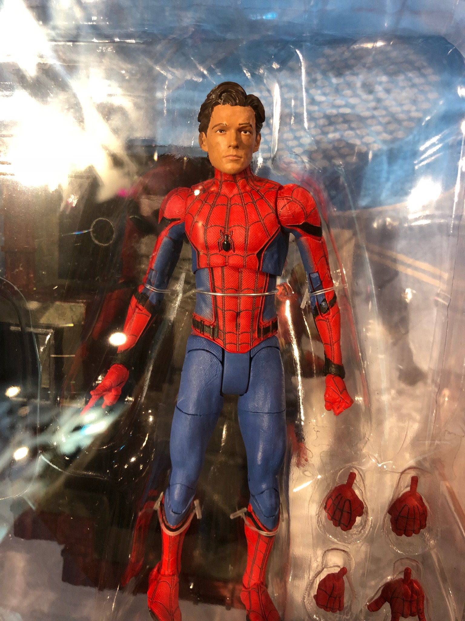 tom holland with action figures
