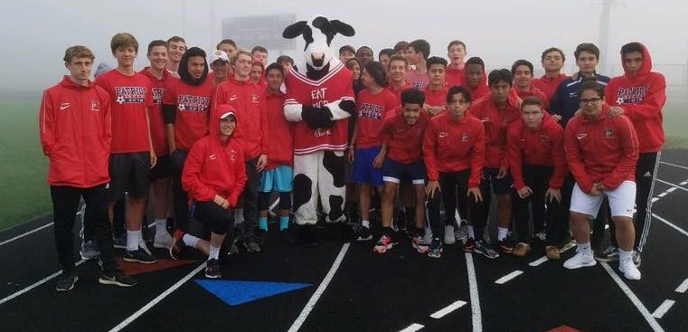 PHSboysVS's tweet photo. We love being able to be a part of the @patriotinteract 5K every year. Special day for us. On another note, we just met the @ChickfilA cow. He brought sandwiches for after the race. Seemed cool. Fair to say he’s a fan now. #PHSBVS https://t.co/HaorHqCGZZ