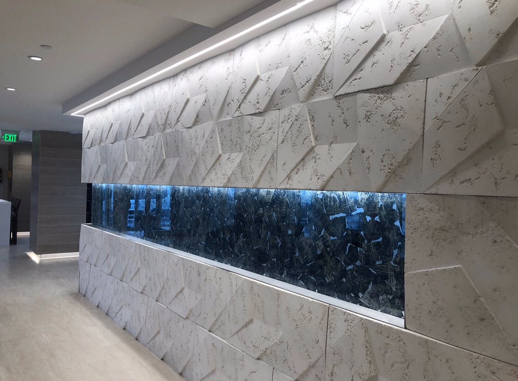 Kolman_Glass's tweet photo. We just completed this lobby project at The Beach House in Revere Beach, MA for Baystone Development. Our glass is the blue ribbon seen in the lobby walls of this gorgeous building. Kudos to Dennis Duffy for yet another stunning design.

The pattern is “Etchings – Blue Silver”. https://t.co/JNMHuzUQ4q