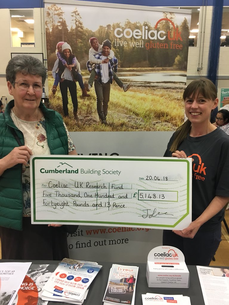 Jean from @CoeliacCumbria presenting final group cheque to Miranda @CoeliacELancs food fair. Thanks to all our committee & all our group members for helping to raise this and I hope it will benefit the Research Fund @Coeliac_UK