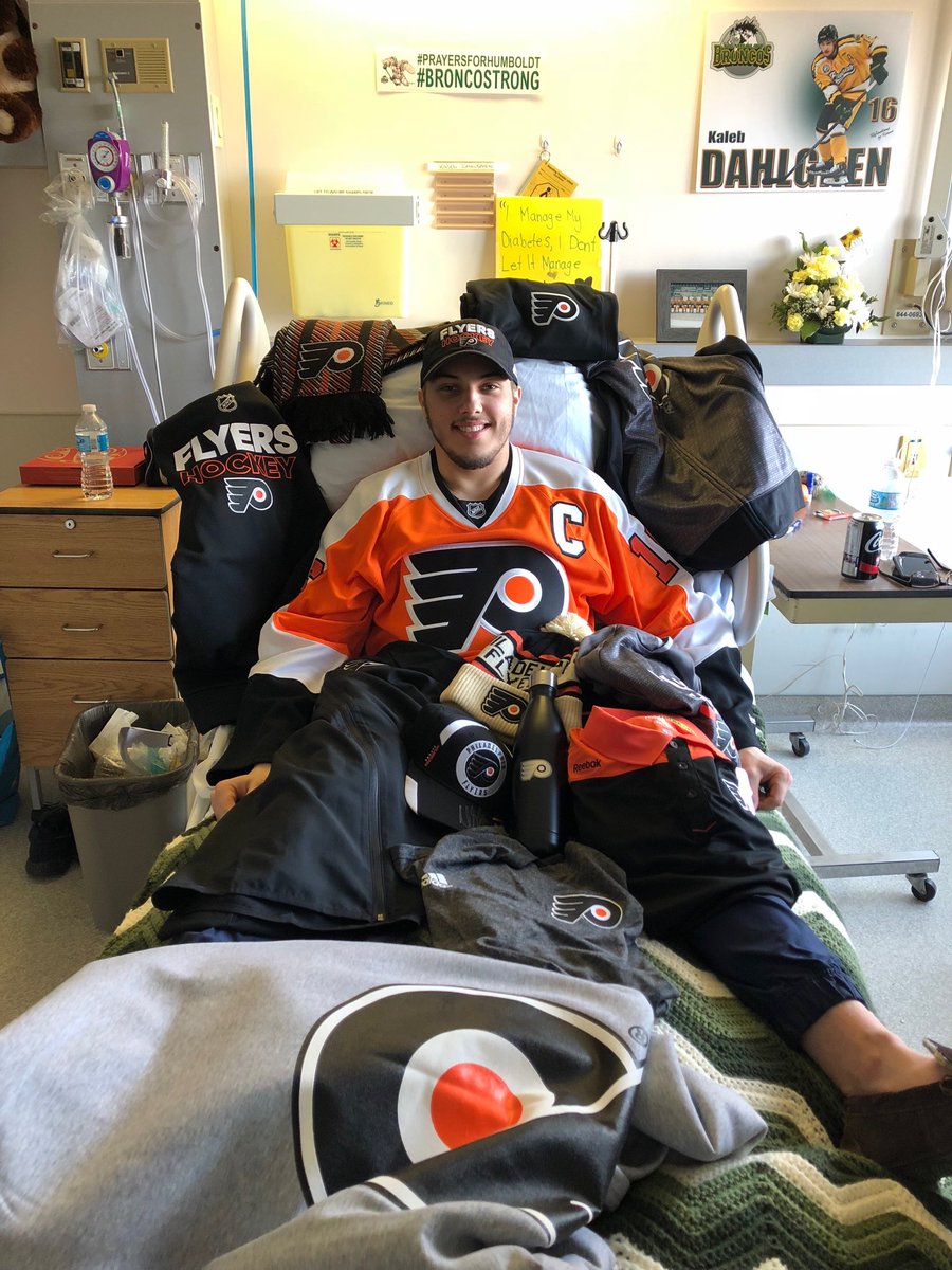 drosennhl's tweet image. This is Kaleb Dahlgren of the Humboldt Broncos in his hospital room. Bob Clarke sent him all the Flyers gear. Dahlgren, like Clarke, has Type 1 diabetes. They recently connected over the phone. Photo from Jody Clarke, Bob’s daughter. Credit: @NHLFlyers.