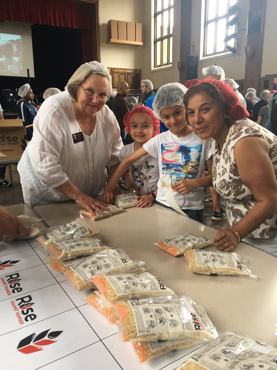 Rotary GBI President Elect Debbie Hodge enthusiastically helped at the RAH meal pack event <a href="/KHVIIISchool/">King Henry VIII Senior School</a> <a href="/RotaryGBI/">Rotary GB & Ireland</a>