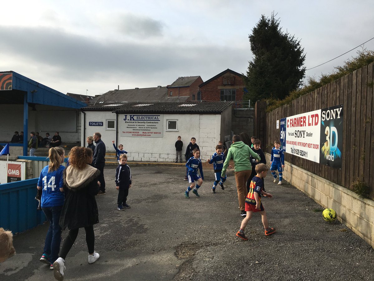 Ramster68's tweet photo. @FourFourTwo Kids playing at Matlock Town whilst the game is going on - Northern Premier League #FFTMyMatchday https://t.co/ok3SAfnOuY