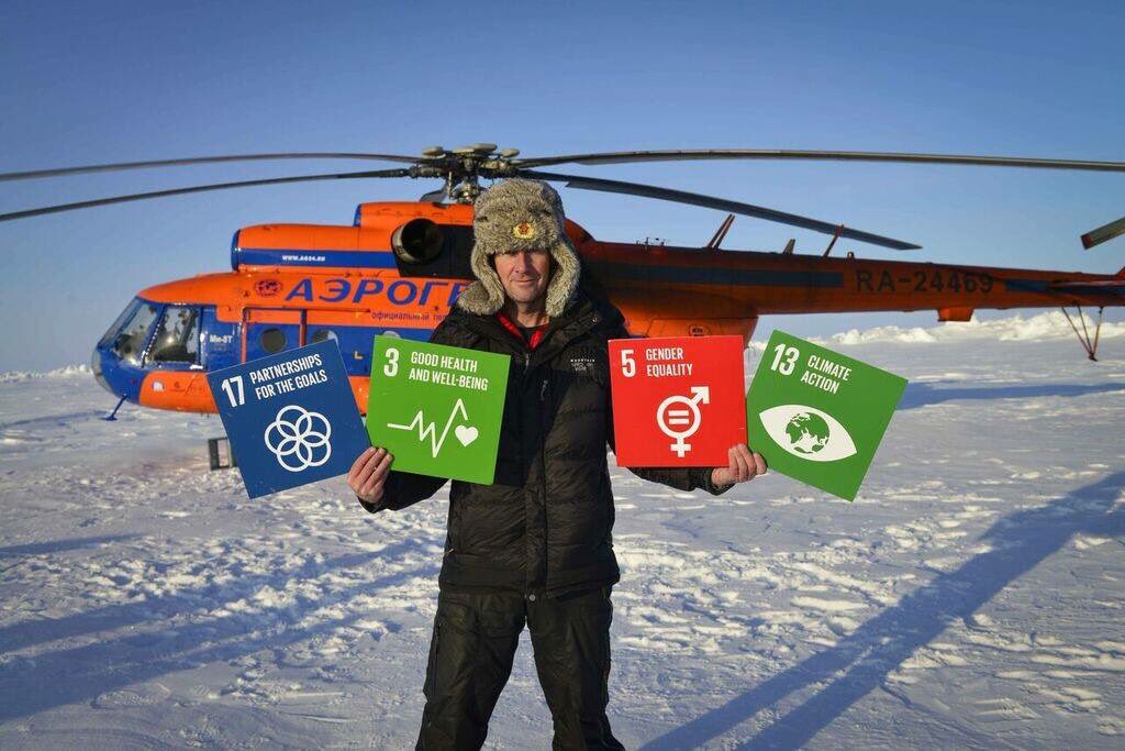 RichardDonovan7's tweet photo. I spoke at the US State Department in 2016 and promised to bring the United Nations Global Goals to the North Pole that year. These are four of seventeen goals to transform our world, at the top of the world! #RightTimeisNow #GlobalGoals https://t.co/r6fZk11Q9k