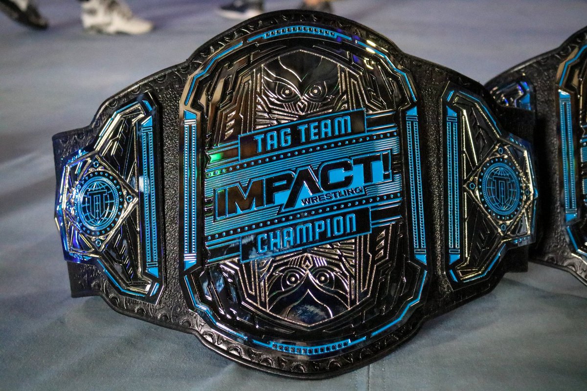 PodcastOTT's tweet photo. We have to admit...
These @IMPACTWRESTLING titles look pretty awesome. The silver on black is bold and powerful. 

Step it up @WWE and dump the red and blue leather. https://t.co/Kr97bfFwn8