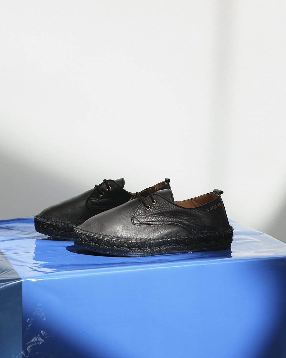 Adding a graphic touch &amp; a sportive sense of futurism — A. 005 18 Cyan Leather, Black. Shop here: bit.ly/2qRWImX