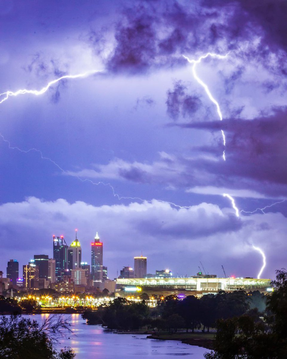 CityofPerth's tweet photo. The city lit up on the weekend! Amazing shot captured by IG/kaneartie.photography 🌩 Share your #Perth city weather photos with us by using #cityofperth 🌩
#perthweather #perthskyline #optusstadium https://t.co/ThG2QOMDFF