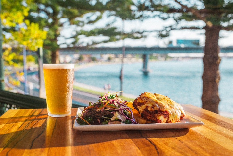 VisitFremantle's tweet photo. Every Monday evening get a parmy &amp; pint (with an awesome view) for just $17 @TheLeftBank  🍽️ 🍺  https://t.co/Dn44tk8MOX #Fremantlestory #nocooking #lovefreo #eatcheapperth #foodiecravings https://t.co/TemxiYLHgM