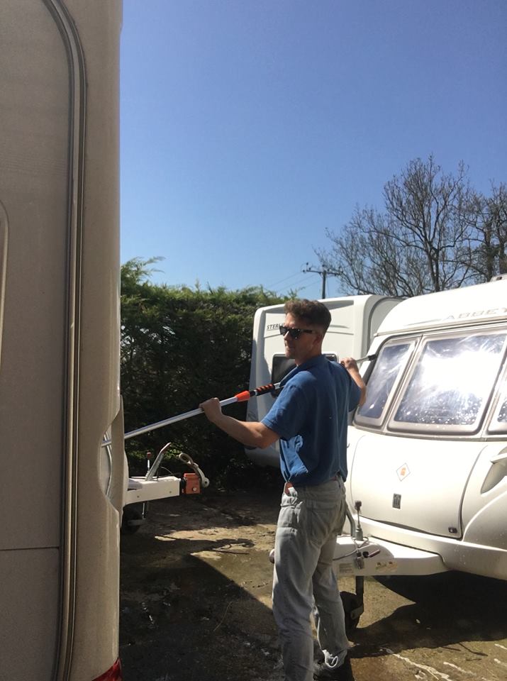 Luke taking advantage of the warm weather at the weekend - the caravans are gleaming! #CaravanHire