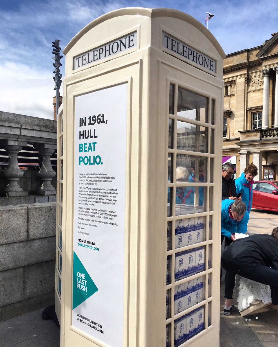 DaveHarrisonGo's tweet photo. This week is World Immunisation Week. To mark the event 2 phone boxes are being filled with sugar in Hull's Queen Victoria Square. In 1961 more than 350,000 people in the city were given the polio vaccination in 1 week thanks to 3,000 volunteers. The exhibition marks that effort. https://t.co/P6cI9RQbD8