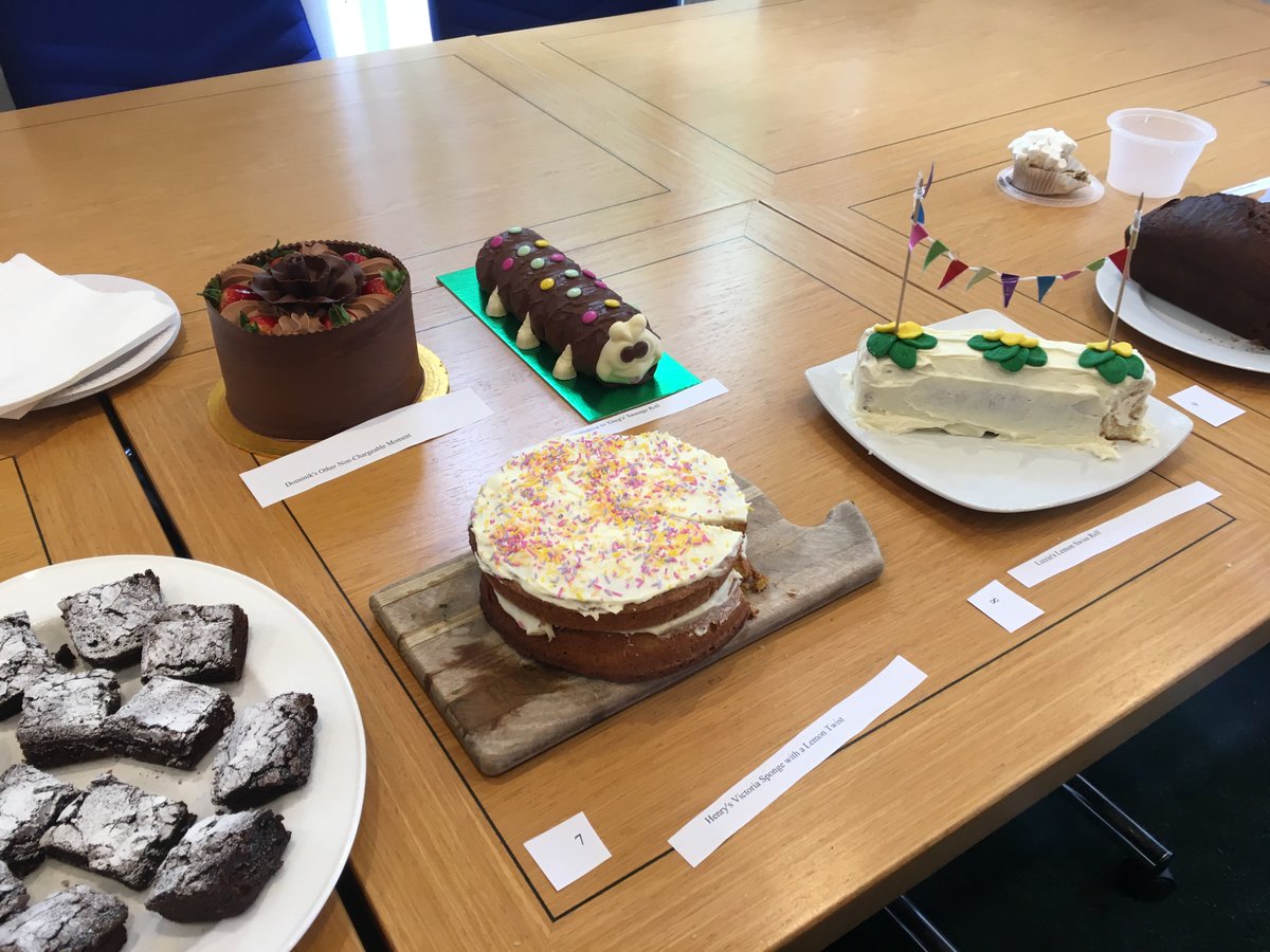 HuntersLaw's tweet photo. Lovely #TeaforTrussell at the office today for @TrussellTrust, our Charity of the Year! Well done and thank you to all of our bakers, particularly John Sweeny for his winning baaa-nana cupcakes! #cakes #baking #bunting https://t.co/xBYa2cu0Q6