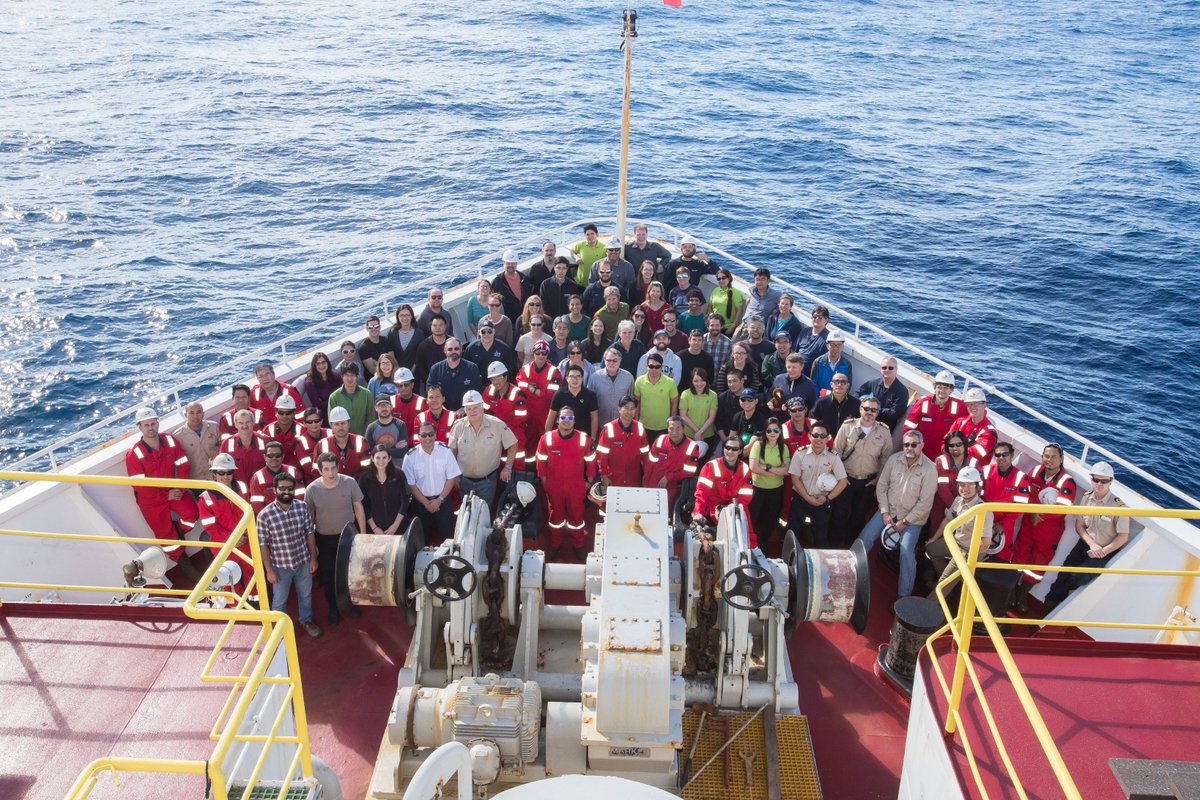 US_SciOD's tweet photo. An aesthetically pleasing △ of talented scientists, engineers, technicians, cooks and drillers...here's the entire crew of #Exp375 studying slow slip EQ at NZ's Hikurangi subduction zone. Spot the cardboard bowtie! #IAmAGeoscientist #shiplife #geology #nsffunded https://t.co/GyA4uNLFYK