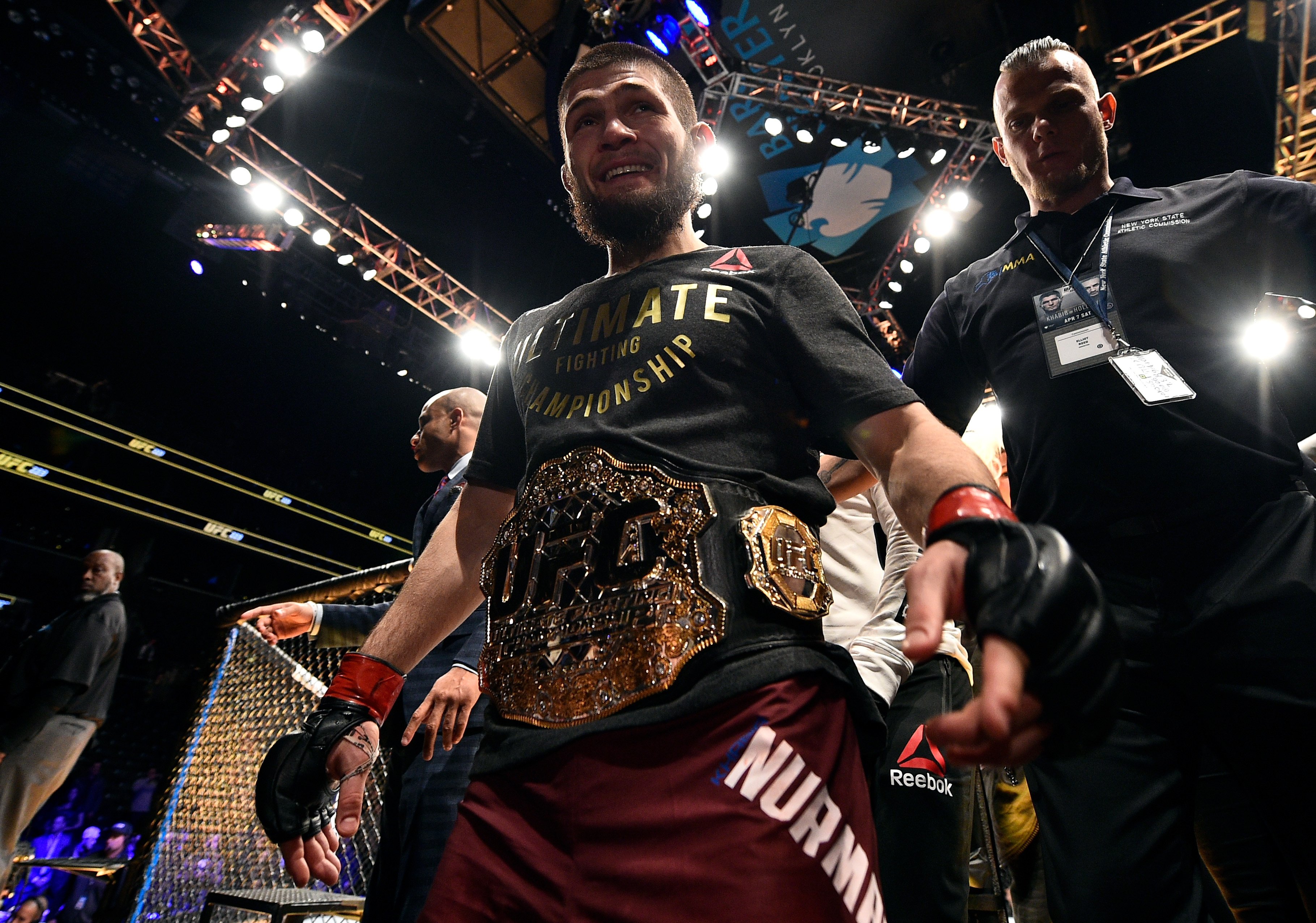 Khabib Nurmagomedov leaves the octagon, after defeating Al Iaquinta for the lightweight title (UFC/Getty Images)