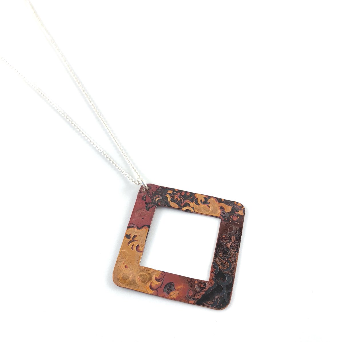 patsykaykolesar's tweet photo. The ease of the Copper Diamond pendant. https://t.co/RkNWXKBX58