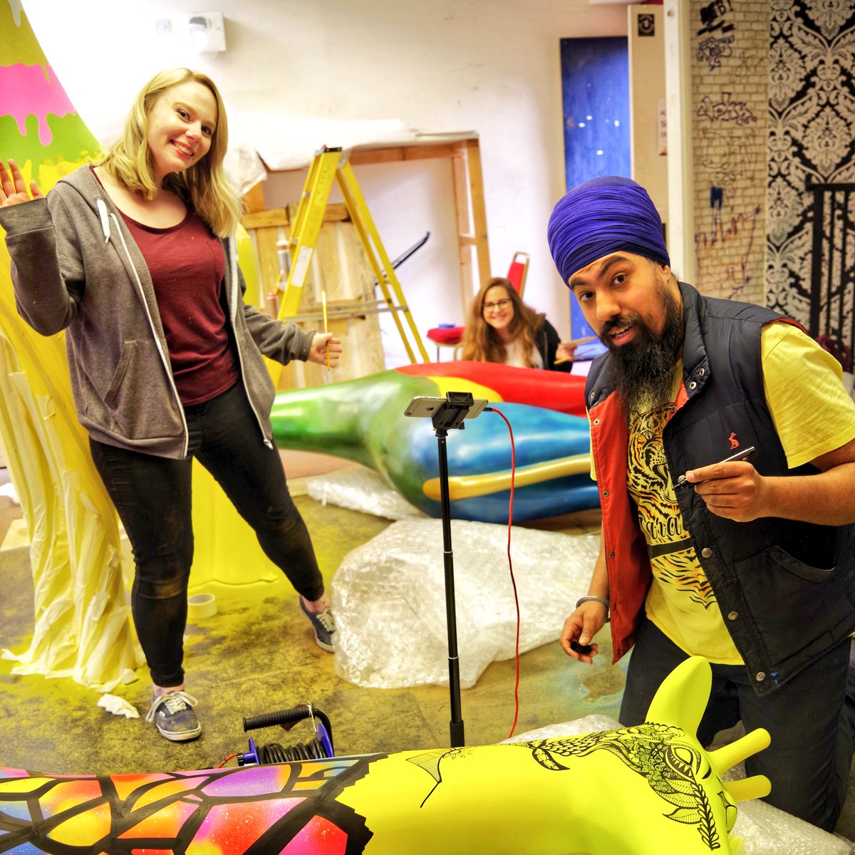 MrASingh's tweet photo. Brummies representing in Worcester! Painting our colourful #WorcStandsTall giraffes! 

w/ @meganevansart @JessPerrin1 https://t.co/EIHH9MSzHz