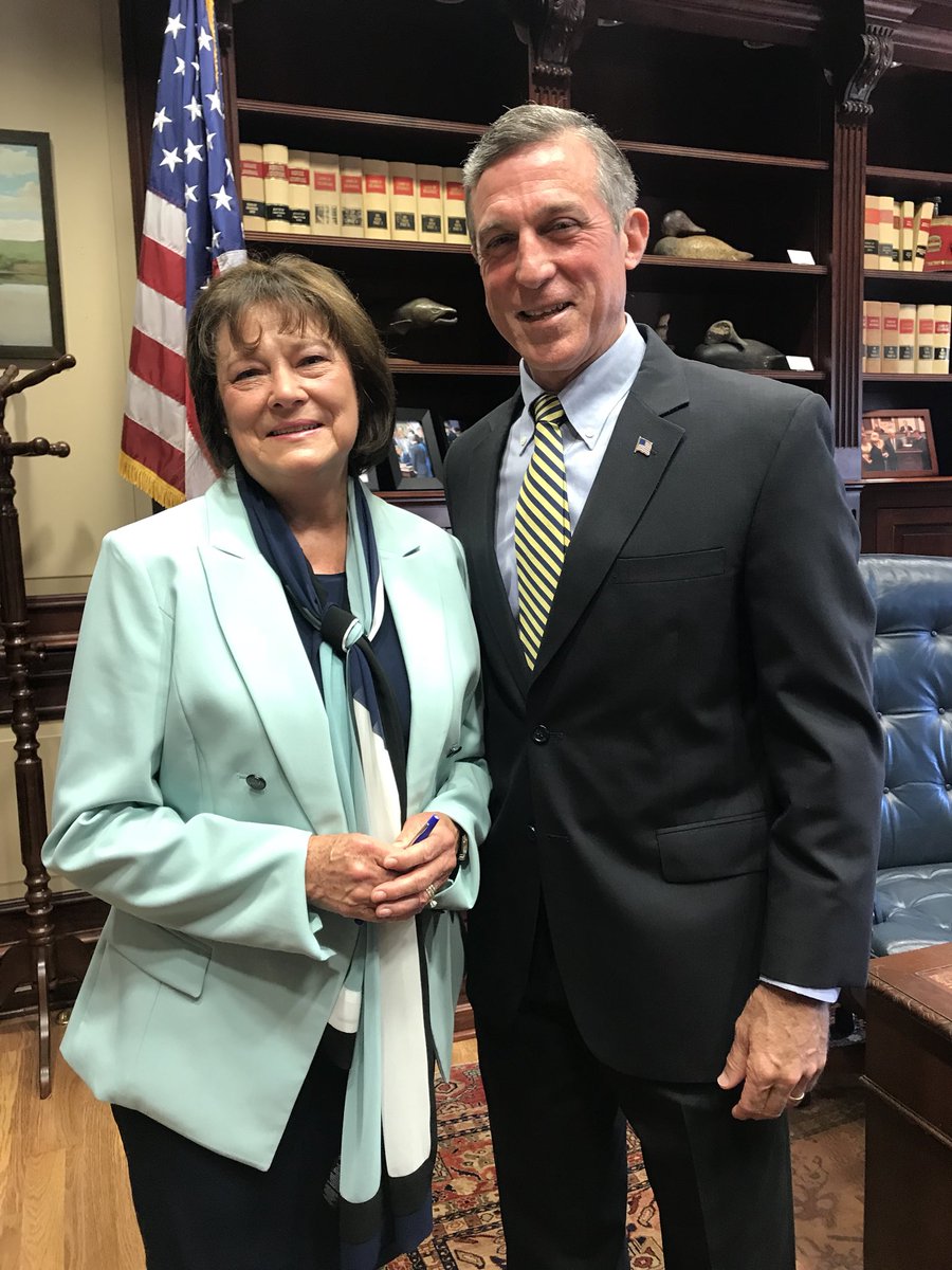 Delaware_HCC's tweet photo. Former Health Care Commission Executive Director, Paula Roy, and @JohnCarneyDE stand together for a photo-op after a Joint Resolution was signed by the Governor recognizing @DHIN_HIE as a locally developed, nationally identified information exchange! #netDE #ourhealthDE #DHIN https://t.co/wRHfvgDogn