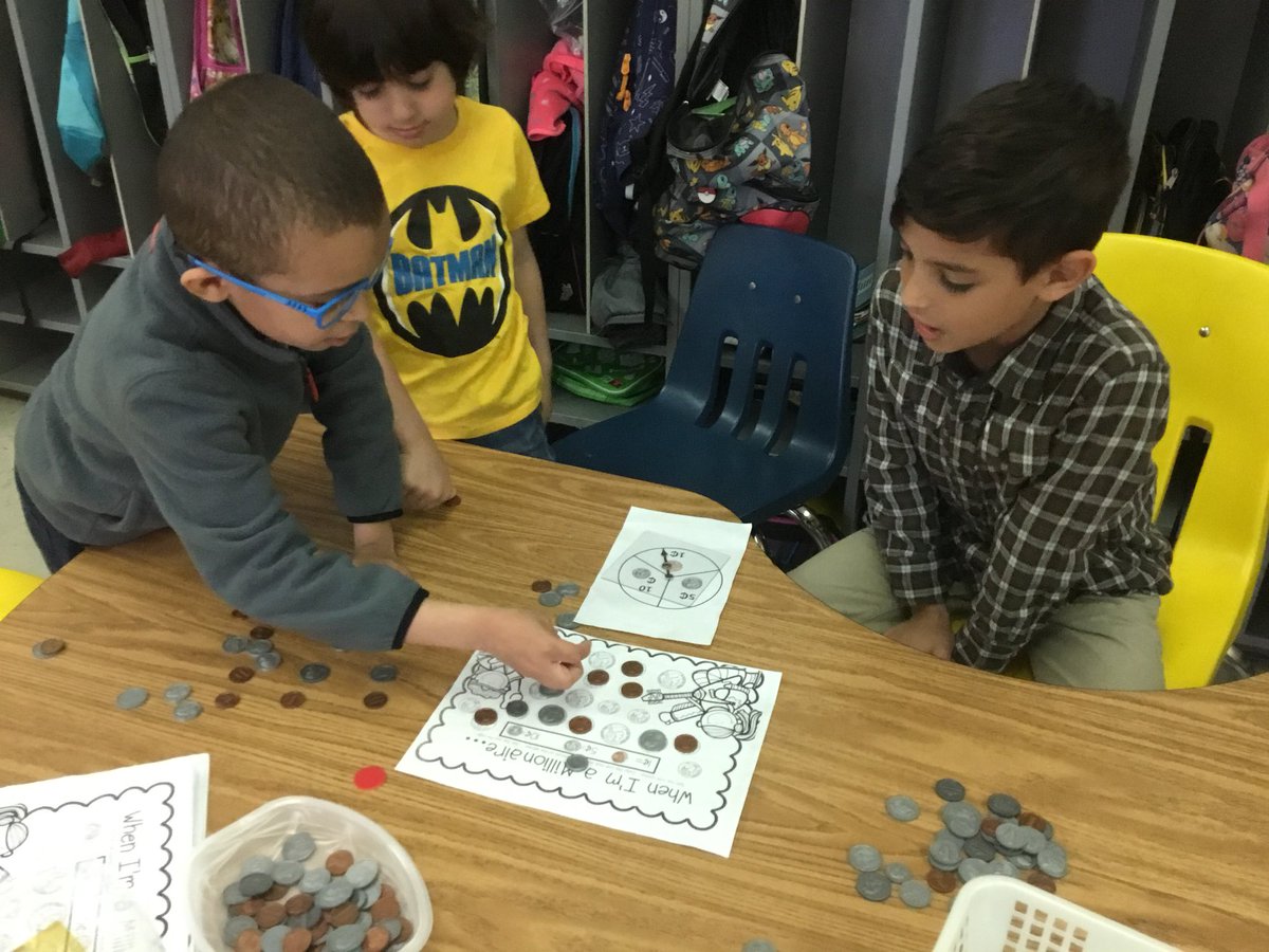 SlavinTeach's tweet image. A bit of @Jack_Hartmann is just the way to start off a differentiated coin game for the #CUBEProgram in 1st grade. @APSMath #APSisAwesome