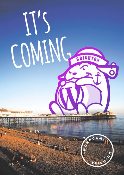 Giant WordCamp Brighton Wapuu positioned on top of Brighton Pier alongside the copy 'It's Coming'