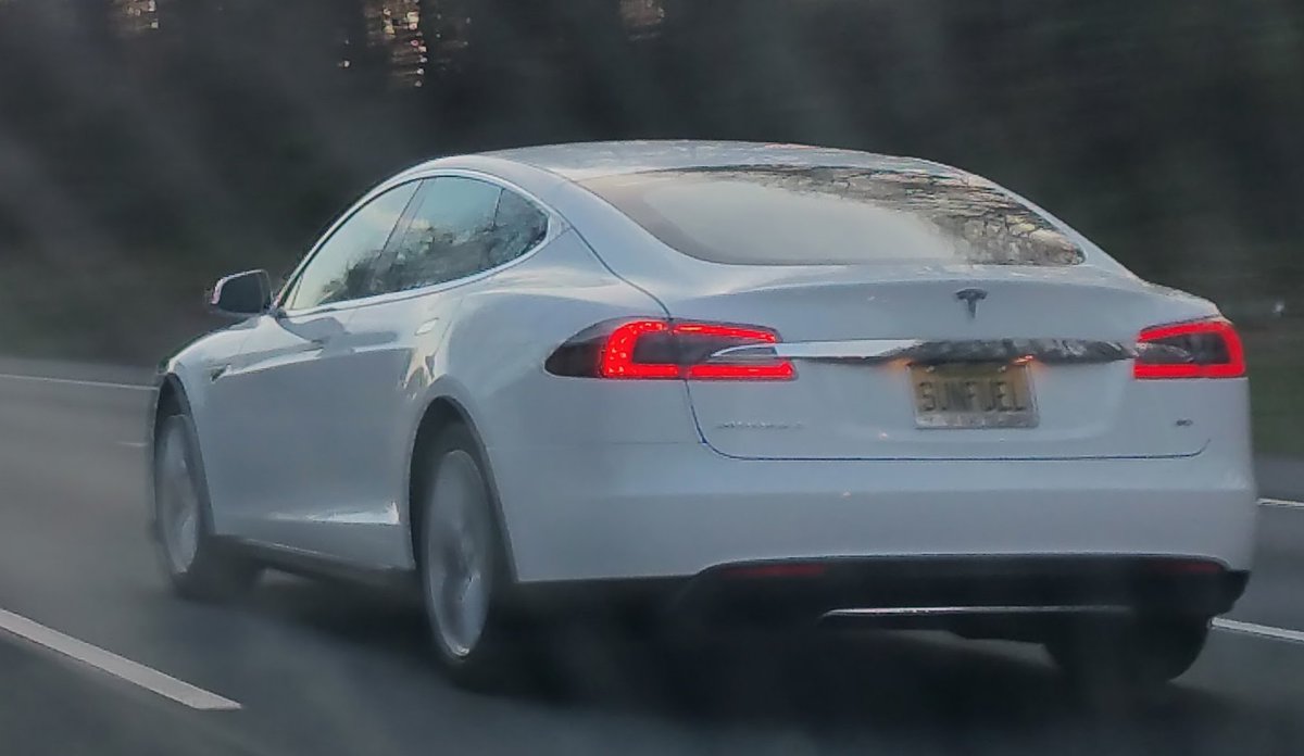 ilybr's tweet photo. Spotted this on the road the other day - awesome license plate for a Tesla: "SUNFUEL"! https://t.co/c5KcZY5H4r