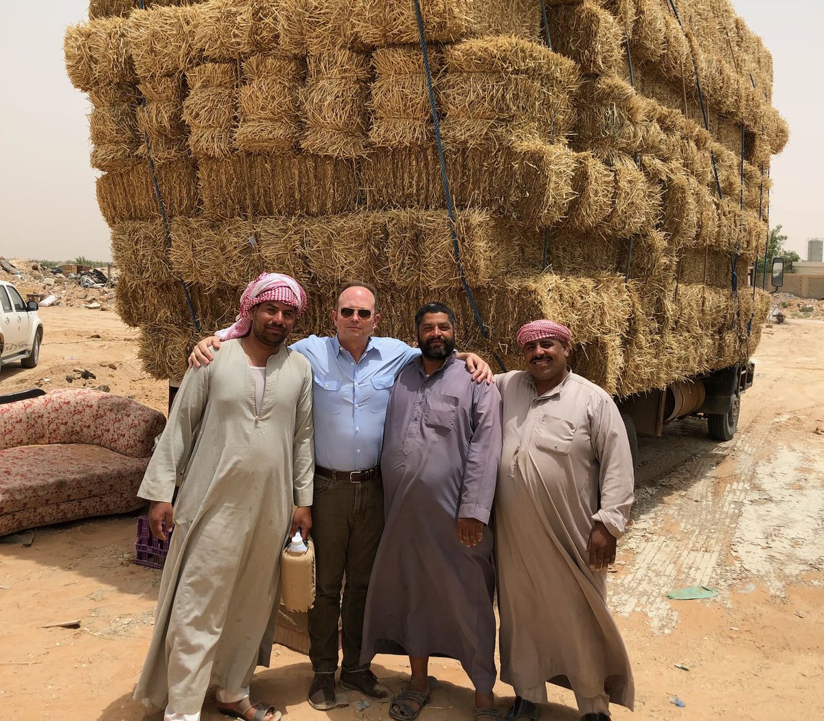 Pacific_Ag's tweet photo. Our own Kerry Calaway and Harrison Pettit traveled to Saudi Arabia to meet with potential #exportforage customers. Here's to new friends and new food (yep, that's camel on Kerry's plate). @Agbiomassfeed https://t.co/CPLju8cHEg