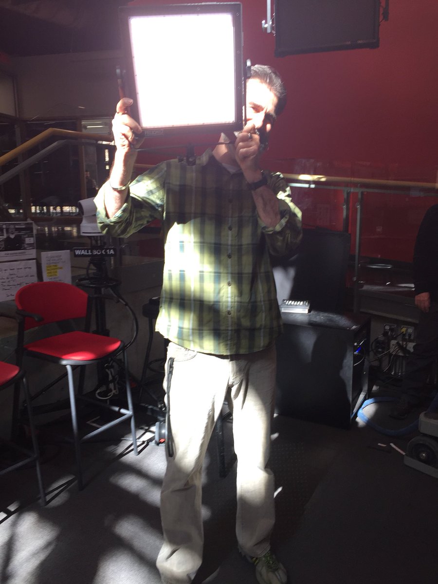 cbcErica's tweet photo. When youโre 90 seconds from a live hit on @NetworkCbc and the lights wonโt work so a colleague scrambles to find a portable one and be a human light stand. #teamwork #hardnottolaugh https://t.co/KWifdxS65n