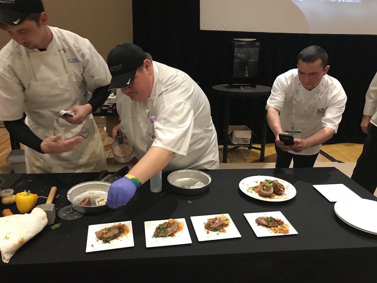 S_Mooresville's tweet photo. We had so much fun cheering on Chef Jenni and Nick at the @TrilogyLiving #CulinaryOlympics! Absolutely delicious and beautiful presentation! #trilogyfresh #abletoserve #teamsprings https://t.co/EaZhmNVjyX