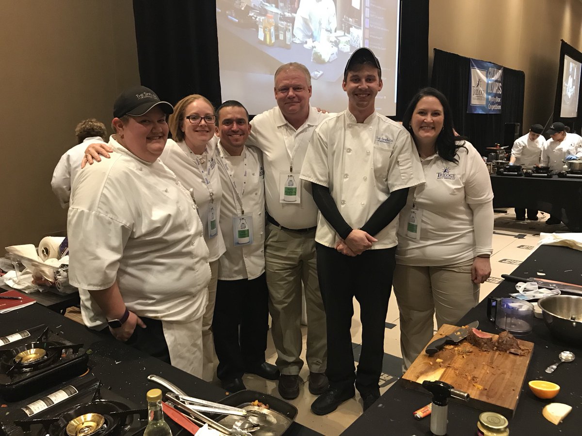 S_Mooresville's tweet photo. We had so much fun cheering on Chef Jenni and Nick at the @TrilogyLiving #CulinaryOlympics! Absolutely delicious and beautiful presentation! #trilogyfresh #abletoserve #teamsprings https://t.co/EaZhmNVjyX