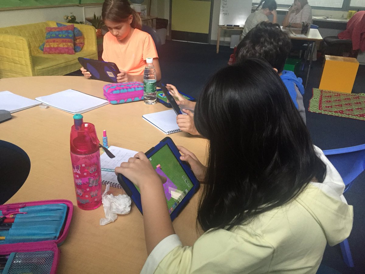 Grade 4 students using #Minecraft to figure out area and perimeter challenges. Such an engaging way to learn math concepts! #aisgz #MinecraftEdu #pypmath #mathchat