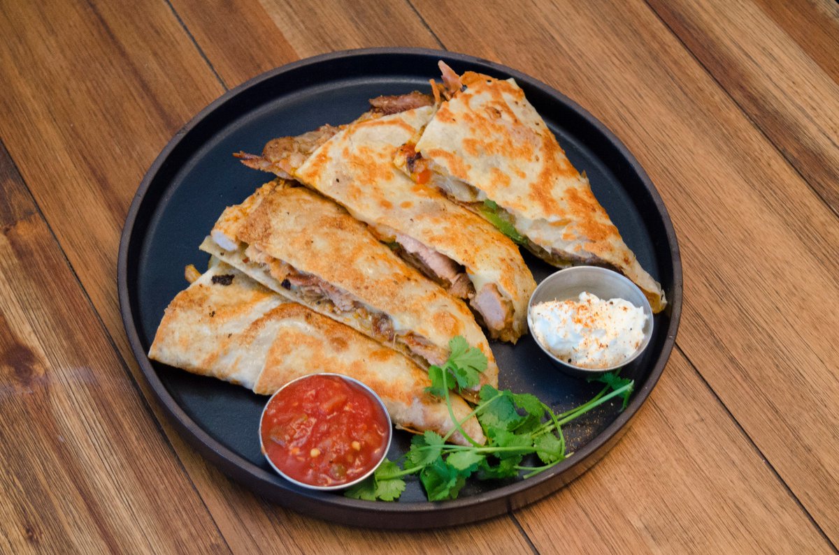 Come enjoy the nice weather and a Carnita Quesadilla or Grilled Buffalo Chicken Club in The Fireside Grill!