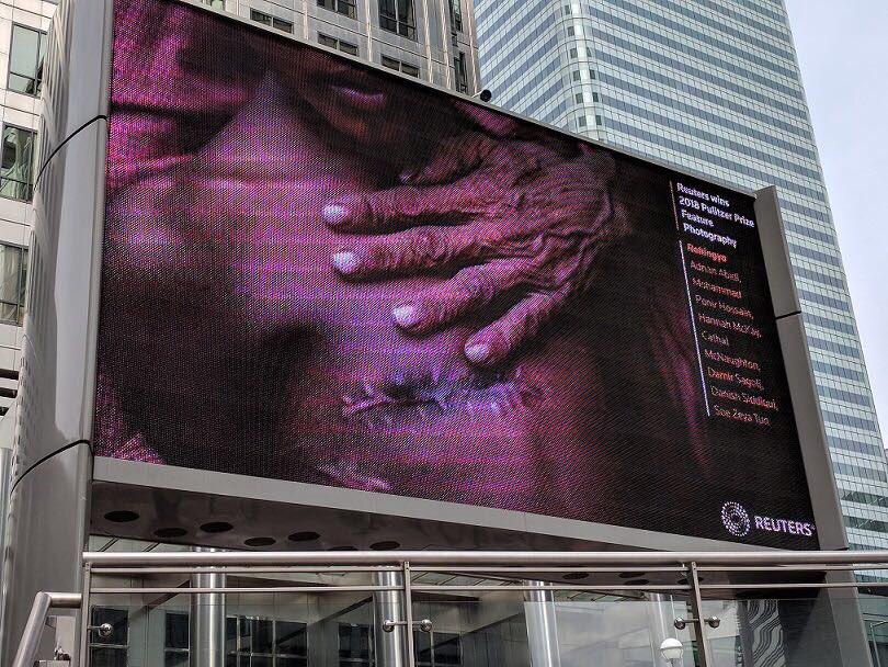 adnanabidi's tweet photo. My work on #RohingyaCrises graced with @PulitzerPrizes part of @reuterspictures team being displayed at #CanaryWharf building in #London #UK https://t.co/nRfFrBzcLr