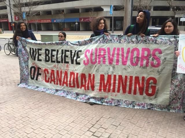 mininginjustice's tweet photo. HAPPENING NOW! "Who mourns #PeterMunk's victims?" People are gathering outside #BarrickGold's AGM this morning, demanding accountability for communities impacted by Munk's legacy of violence & creating a scene to counter his image of benevolence! | https://t.co/CqEQbhmHgz https://t.co/ppaiVDGm32