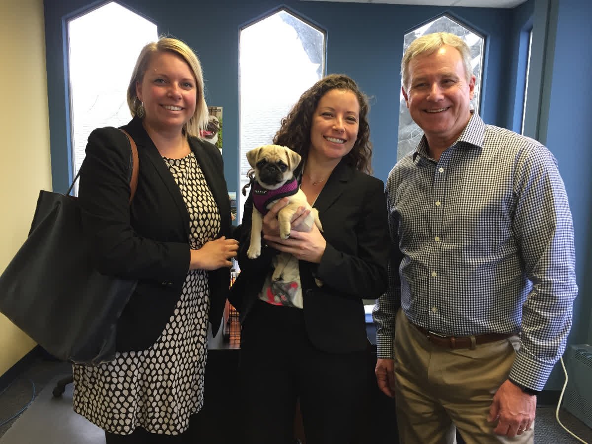 SafeHarborsGO's tweet photo. What could be better than a bring-your-dog-to-work day? This is Melissa's little guy, Gizmo. He's joined by Erin and Hannah from National Car Rental. And, Jay got in the photo op too. #SafeHarborsLife https://t.co/qhtNMS12Ou