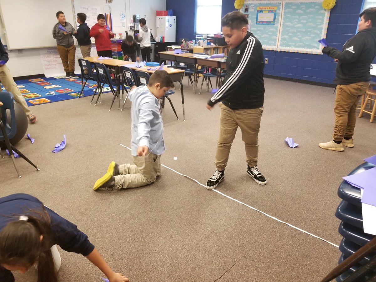 SBSullivan9's tweet image. Today in 5th: we made our BEST paper airplanes, flew them (safely) across the room, and measured the distance in inches and centimeters.  Then, we converted that to feet &amp;amp; meters. #mathisfun #mathmovement