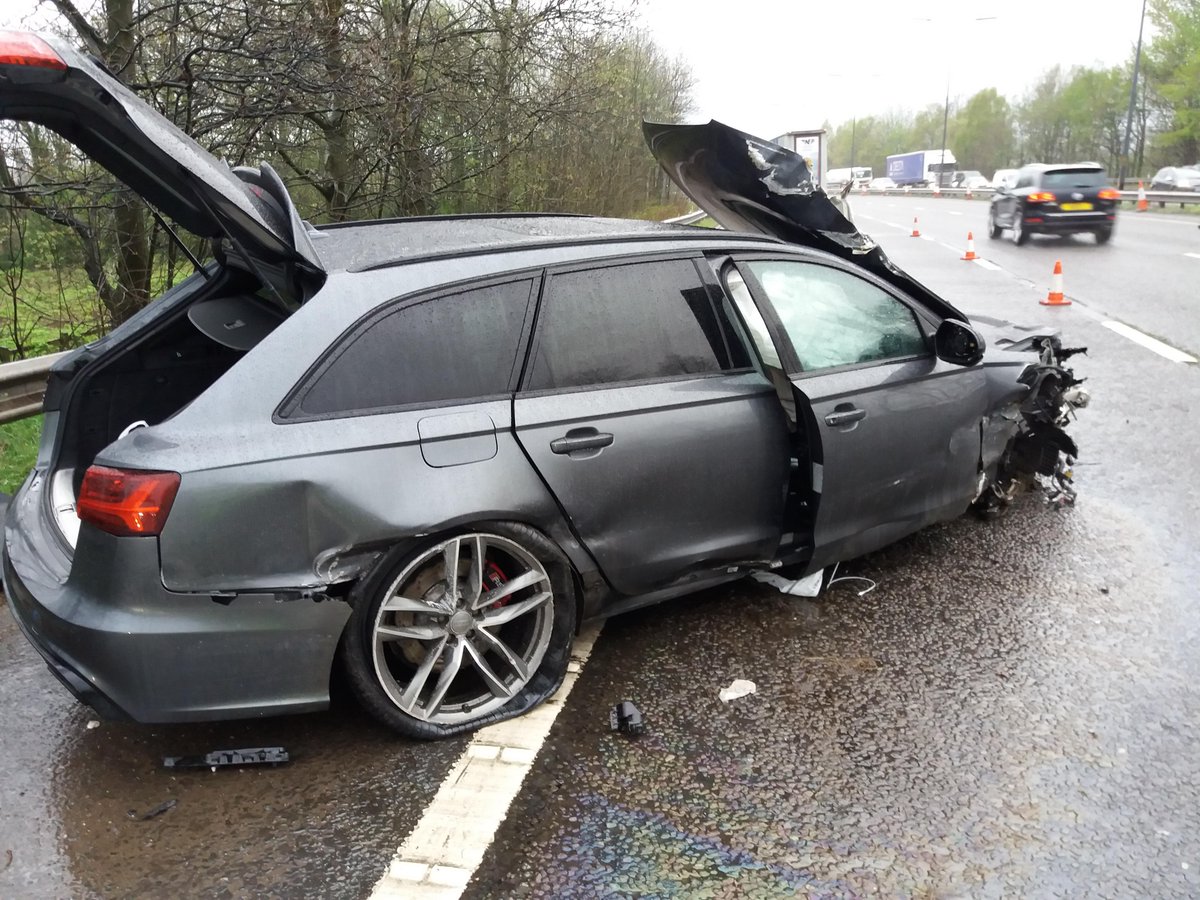 gmptraffic's tweet photo. Audi RS4 vs Central Reservation. Only minor injuries despite significant damage. Driver apparently aquaplaned. Another reminder to drive to the weather conditions! https://t.co/ov9xg6PNnm