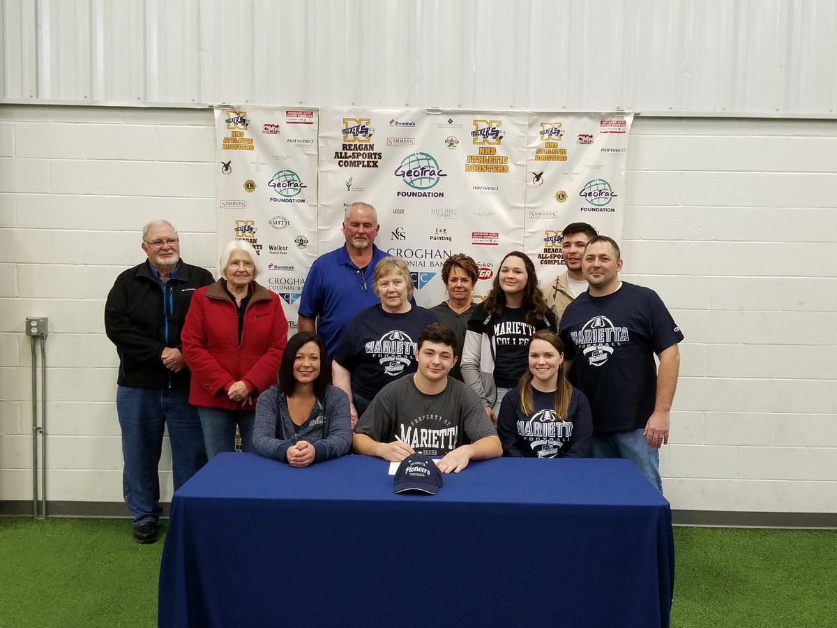 NHSTruckers's tweet photo. Drake Neuberger signs his letter of intent to play football at Marietta College. Congratulations Drake! https://t.co/tw9DHr4flM