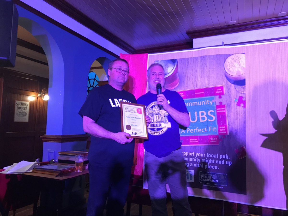 CambridgeCAMRA's tweet photo. @HelpHareHounds collect The Most Improved Rural Pub!! https://t.co/G0Xhvoegtr