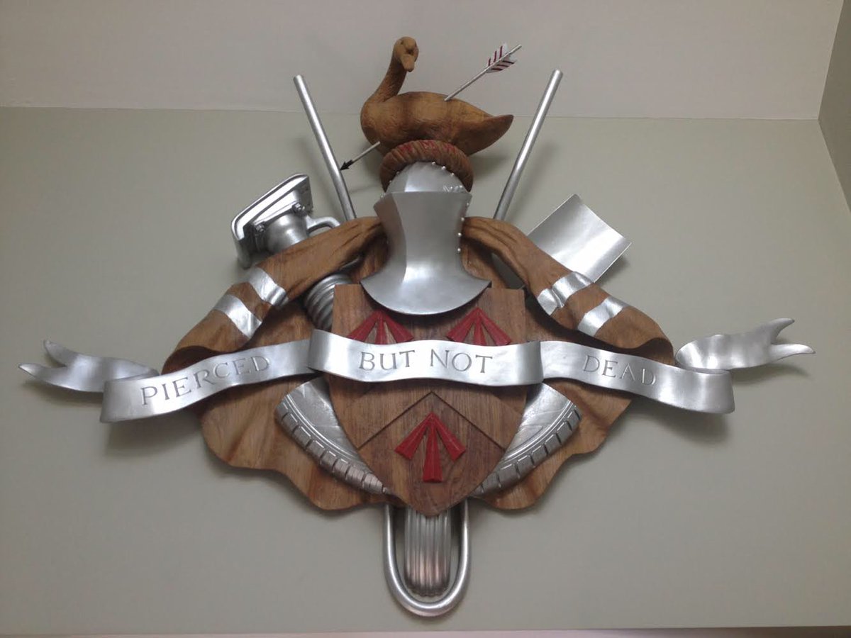 ghscreation's tweet photo. A coat of arms, designed and created as a homage to a career in roadworks #heraldry #art #design #woodsculpture https://t.co/AI01RXL8i0
