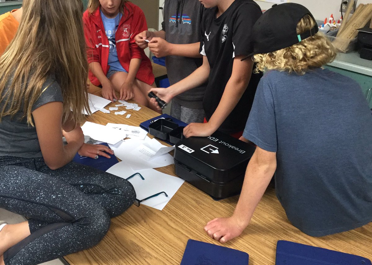 SoCalSTEAMteach's tweet photo. 6th grade students working together on a @breakoutEDU challenge.  45 minutes to solve the clues to help the President find his speech on alternative energy. #BreakoutEDU @AdaHarrisKids @CardiffSchools https://t.co/NGvmkaB7Ro