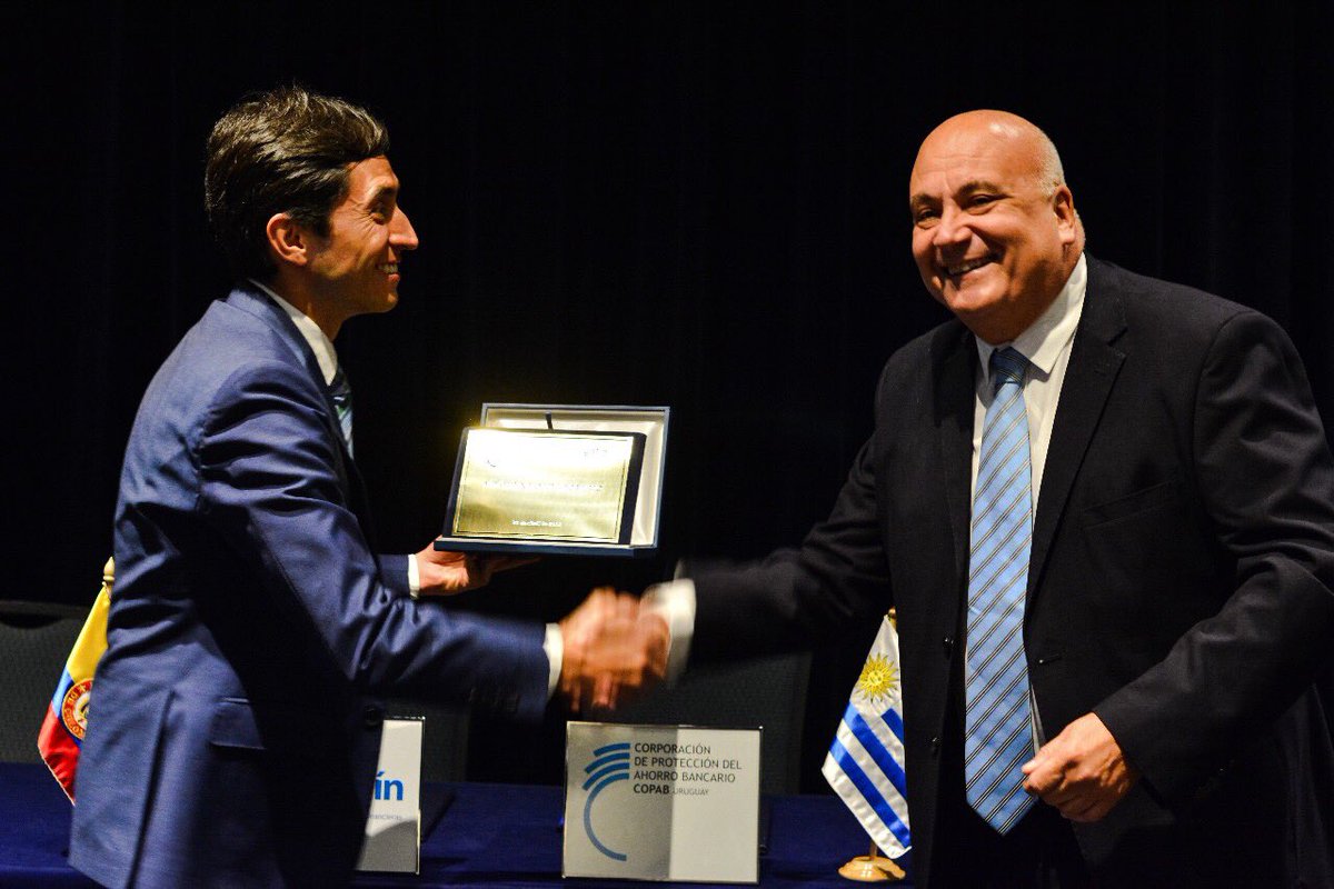 Fogafin's tweet photo. En el marco de la reunión de aseguradores de depósitos de las Américas, @Fogafin y la COPAB de Uruguay suscribieron un memorando de entendimiento para promover la cooperación técnica entre las dos agencias https://t.co/d4F5R9mcfz