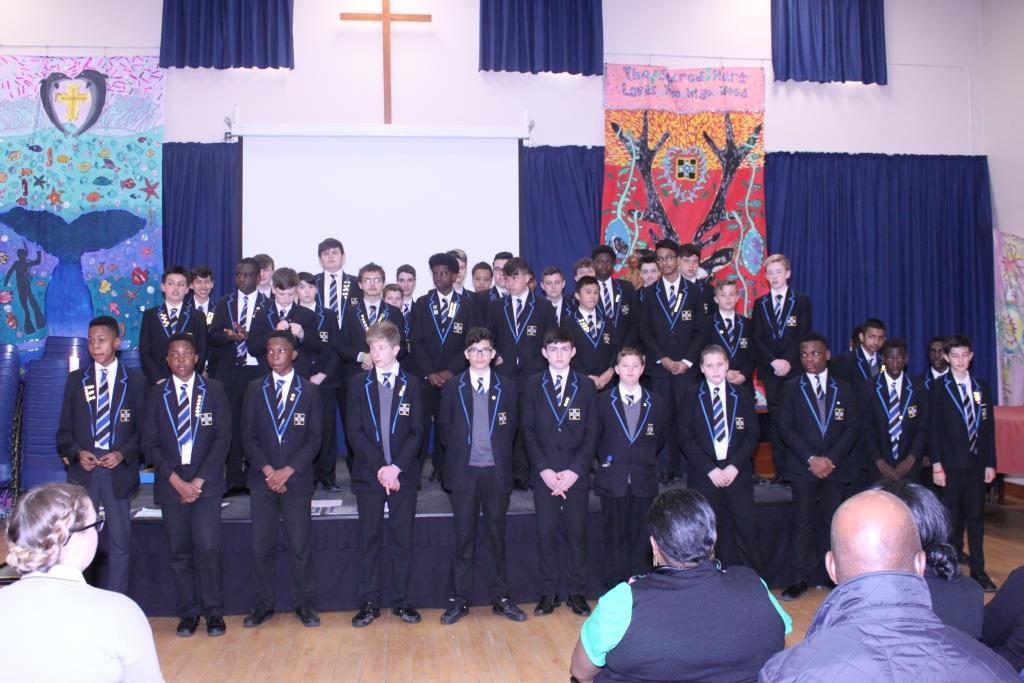 StColumbasCBS's tweet photo. Progress Tsars* - all 41 of them!  Poor picture but also present are 1st ever Red Star recipients (Gold Tsars = 5 Grade 1 in A2L inc Eng &amp; Maths; Red Tsars = Grade 1 across the board!)
#WellDoneMalachyLucaGodfreyVenuChiefDerenandFinn
#UniqueHashtag https://t.co/xwzgiVIgCx