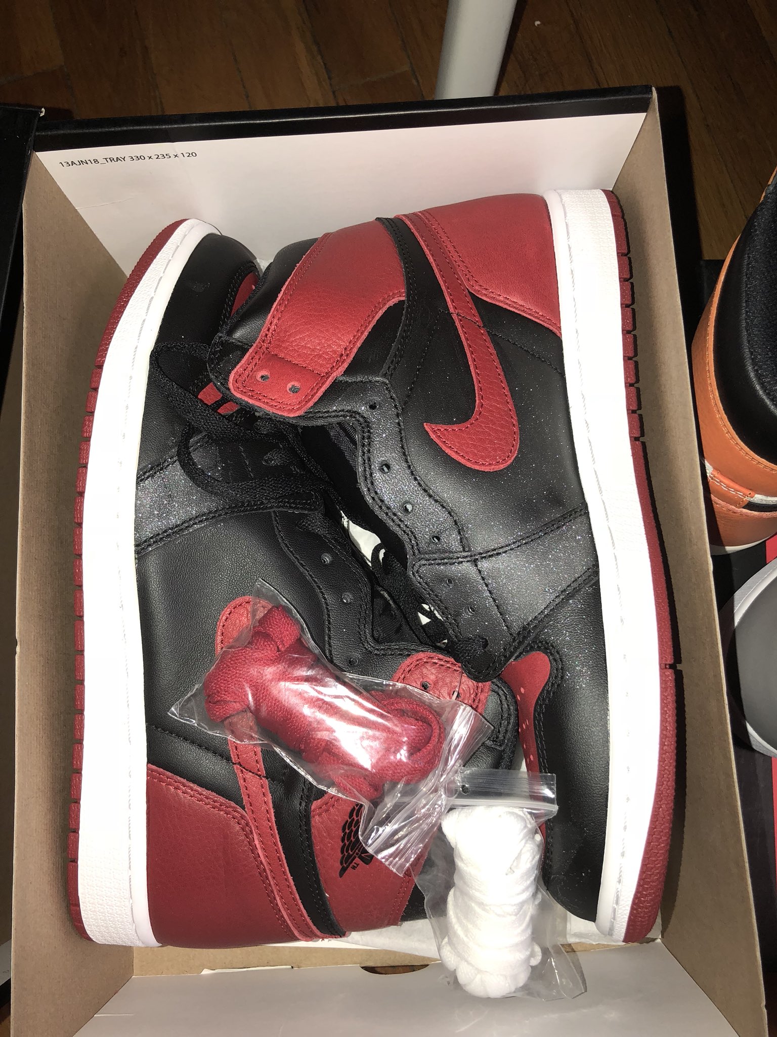 Franchizzze on X nikestore nikesportswear nikestore nike Any idea why my 2016 Jordan 1 bred has a glitter like looking substance on it Some of my deadstock Jordan 1 pairs has them