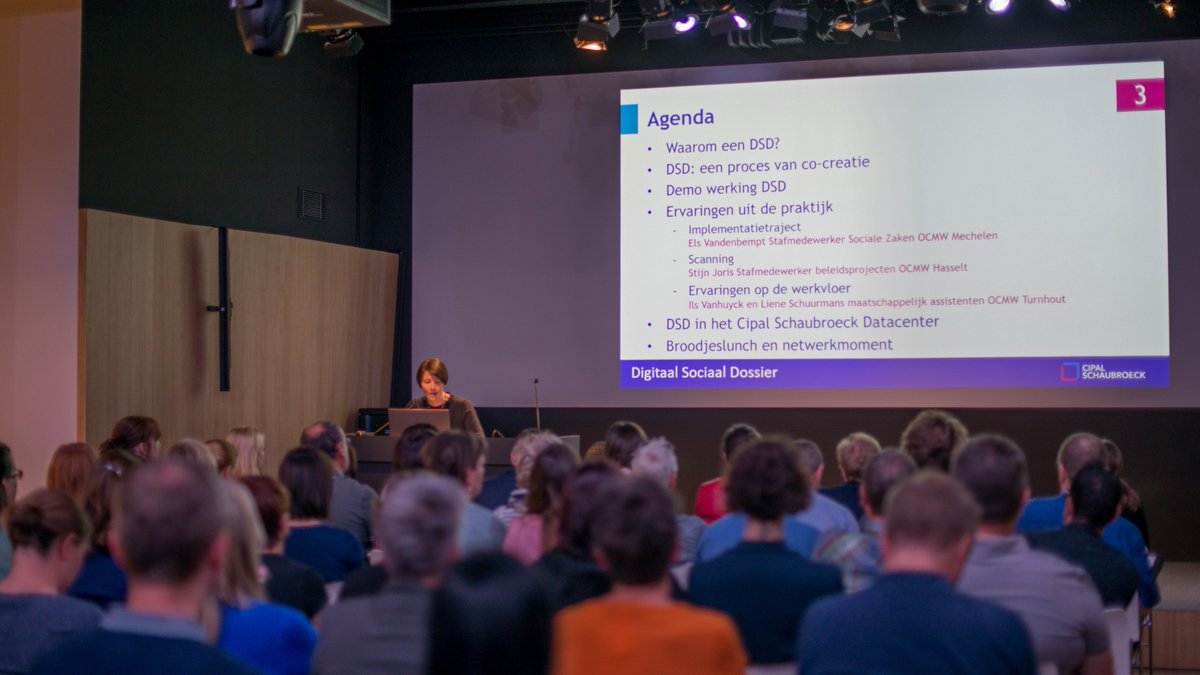 kat2cip's tweet photo. Grote opkomst voor de voorstelling van het Digitaal Sociaal Dossier in het datacenter van @CipalSchaub. De getuigenissen over de implementatie bij Sociaal huis Mechelen, OCMW Hasselt en @OcmwTurnhout wisten de deelnemers te bekoren. https://t.co/ywwURjhVDP
