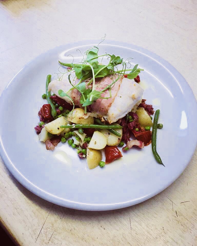 Fillet of Hake Wrapped in Bacon, Sautéed Potatoes, Peas, Green Beans, Pancetta, Sun Blush Tomatoes, Lemon Oil
#thegalleyios #stmarys #IslesofScilly #freshfish #freshproduce <a href="/CelticFishGame/">Celtic Fish & Game</a> @fruitsales