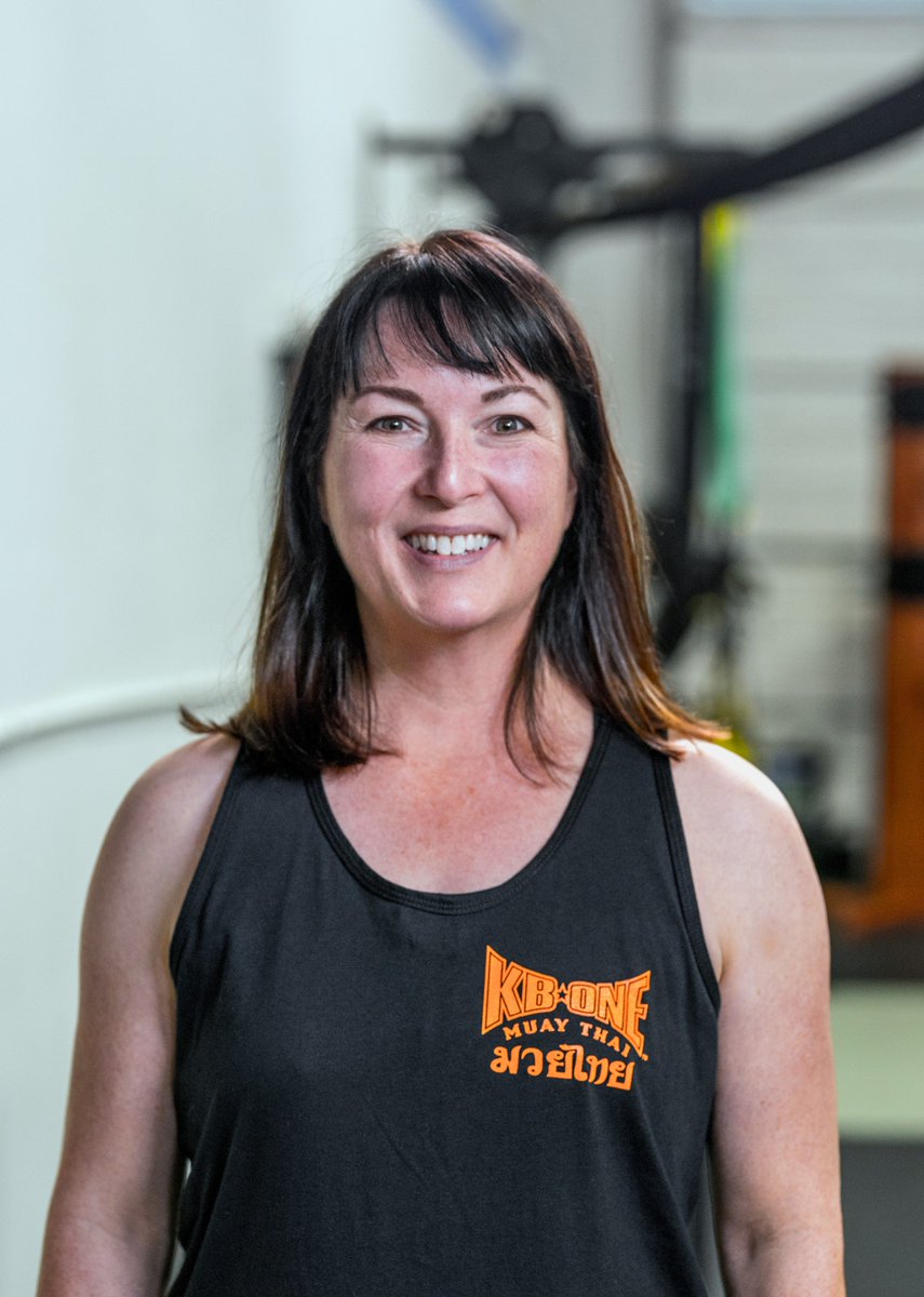Debbie Lee Evans poses for a photo before her Muay Thai kickboxing class.
