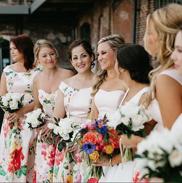 Let your maids bloom with boldly patterned gowns like these fab floral frocks from <a href="/alfredsung/">Alfred Sung</a> 💐 / planning + design Pure Luxe Bride / florals <a href="/WildFlowersInc/">WildFlowersInc</a> / venue <a href="/thecedarroomchs/">The Cedar Room CHS</a> / bridesmaids dresses <a href="/AlfredSung1980/">ALFRED SUNG</a> at <a href="/bellabridesmaid/">Bella Bridesmaids</a> / 📸 Monika Gauthier