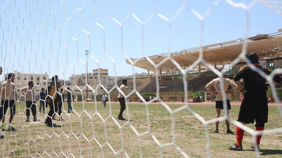 SyriaCivilDef's tweet photo. After 5 months of restoration work @SyriaCivilDefe opened the local stadium in #Idlib today. 1st match held today between team White Helmets and the University team which ended with a draw between them. For more: https://t.co/xDmzNqbbqJ https://t.co/P1dYNMzrOc