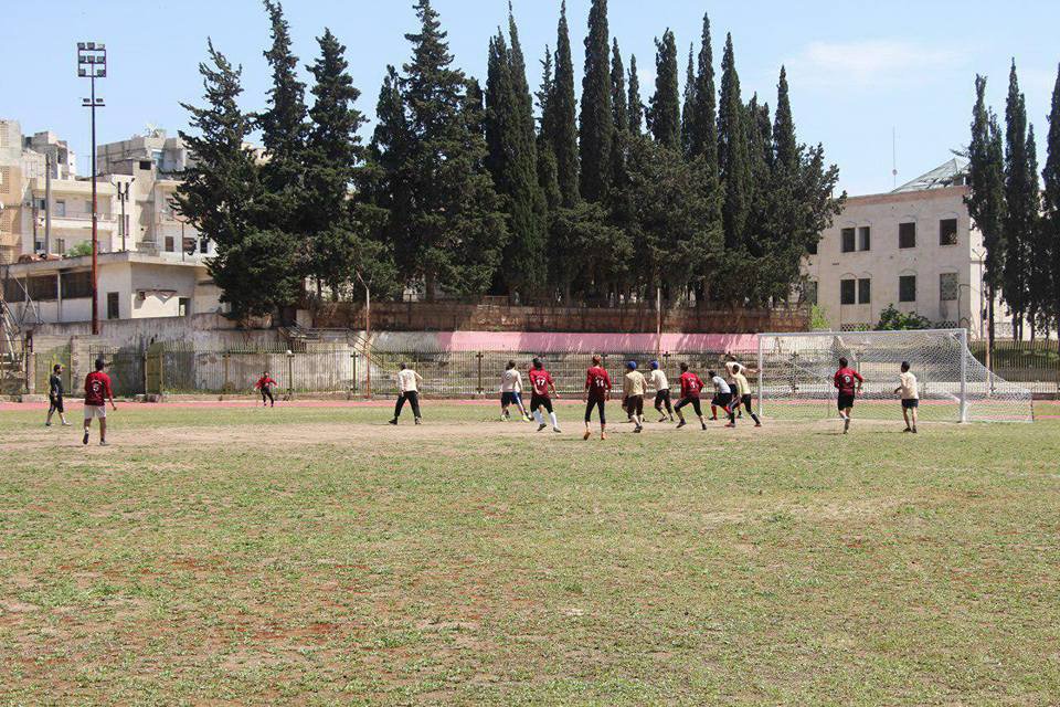 SyriaCivilDef's tweet photo. After 5 months of restoration work @SyriaCivilDefe opened the local stadium in #Idlib today. 1st match held today between team White Helmets and the University team which ended with a draw between them. For more: https://t.co/xDmzNqbbqJ https://t.co/P1dYNMzrOc